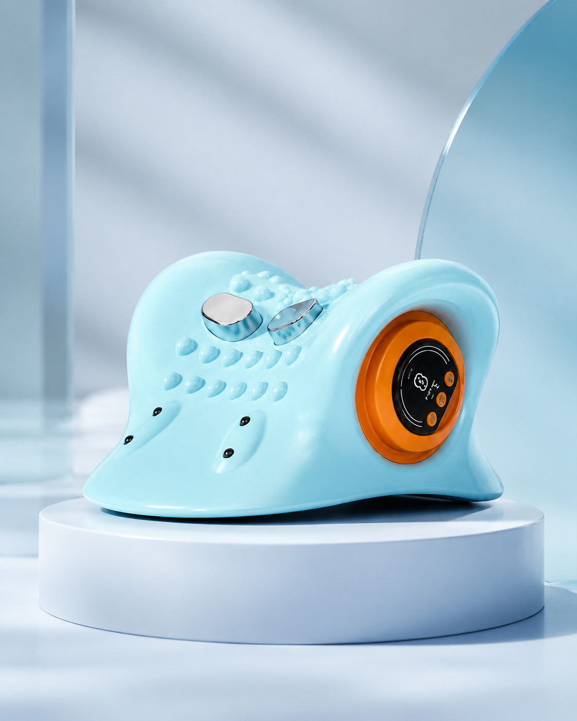 Turquoise cervical neck traction and EMS massager on a studio pedestal